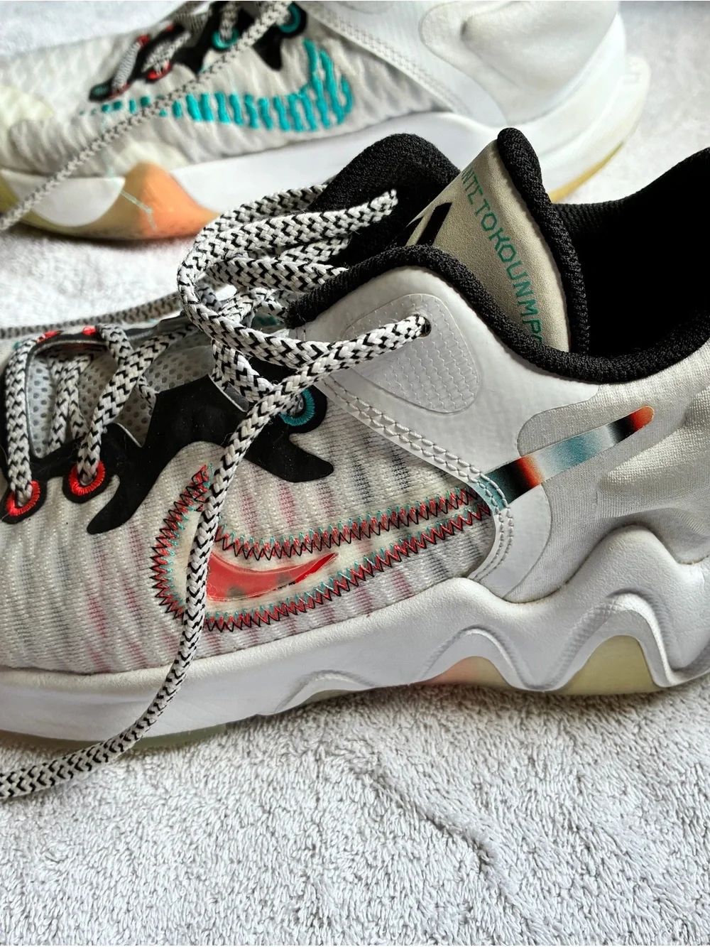Nike Kids White Sneakers with Teal and Coral Accents